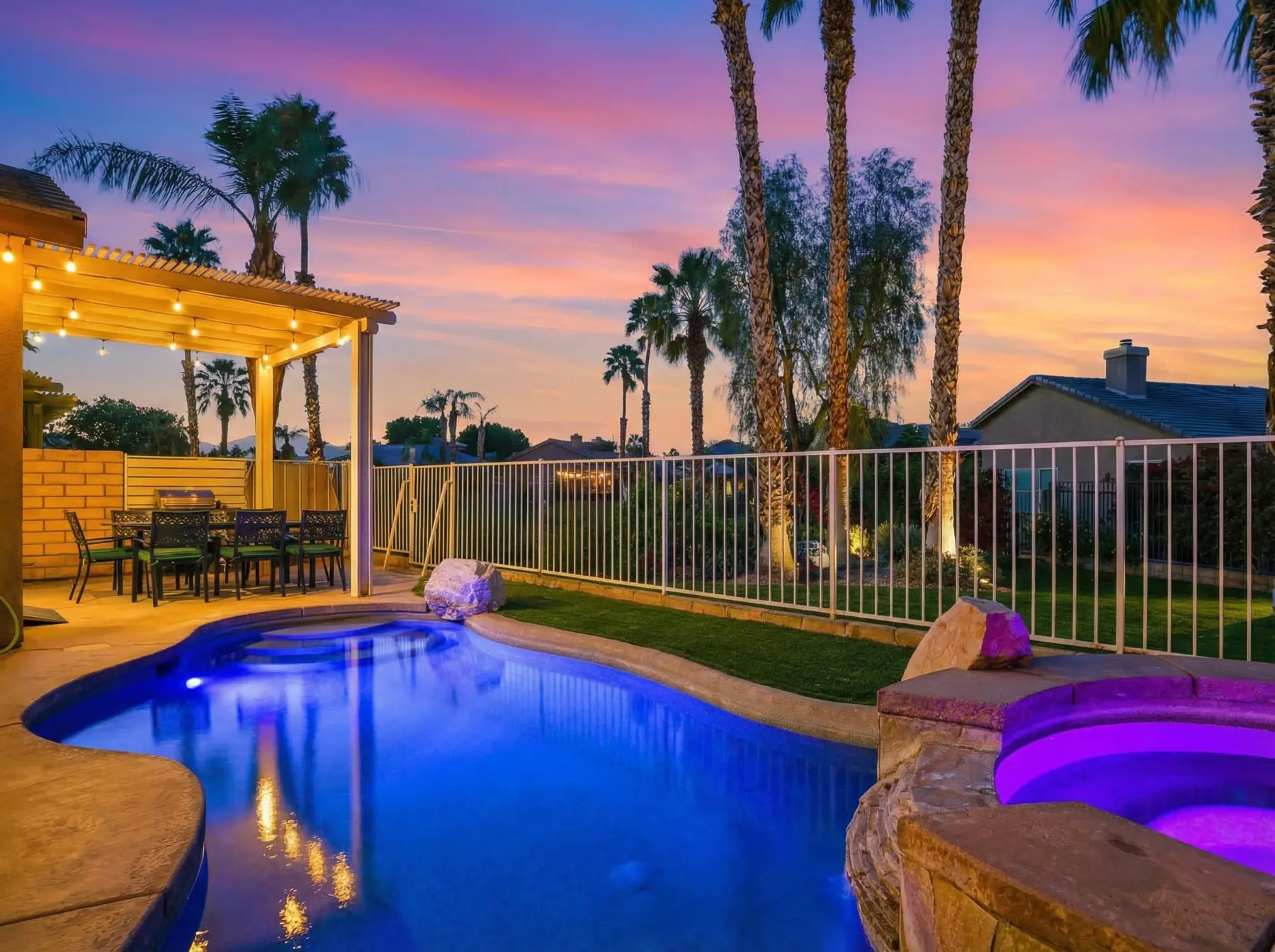 Full exterior of private pool vacation rental at Indian Palms Golf Resort Indio CA at dusk