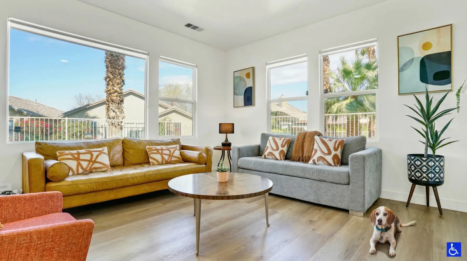 Bright open floor plan living room at Indio Access ADA accessible vacation rental in Indio California with palm tree views